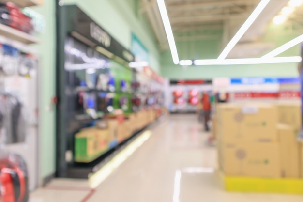 Eletronic department store show Television TV and home appliance with bokeh light blurred background