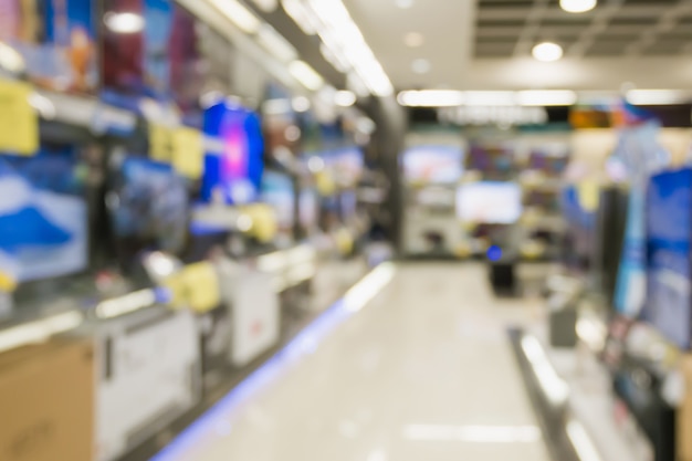 Eletronic department store show Television TV and home appliance with bokeh light blurred background