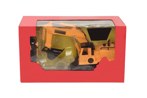 Photo elevated front view of a toy box with an excavator on white background