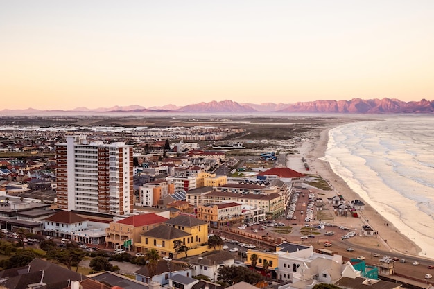 Elevated panoramic view of Muizenberg beach Cape Town at sunset