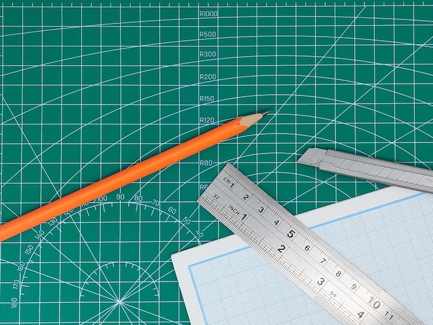 Elevated view of green cutting mat and stationary