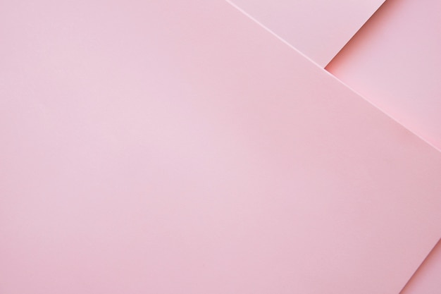 Photo elevated view of pink colored craftpapers