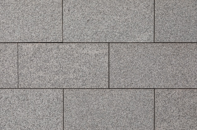 Elevated view of shiny granite tile surface inside building