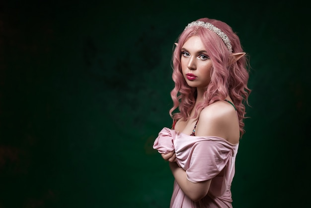 Elf girl with pink hair. Fantasy woman.