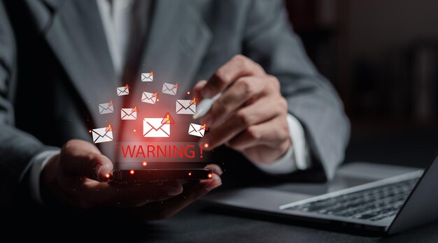 Email spam virus warning businessman reading electronic mail with smartphone Spam junk mail Spam email notifications