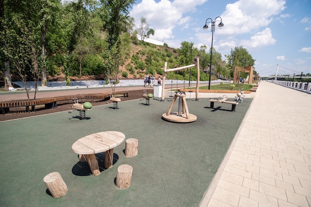 Photo embankment of the urals plot city promenade with a playground