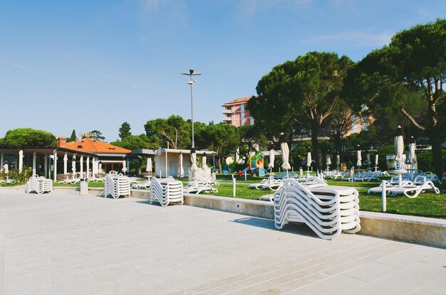 embankment with ships and yachts. Adriatic coast and blue sea in Slovenia. Holiday, summer vacation