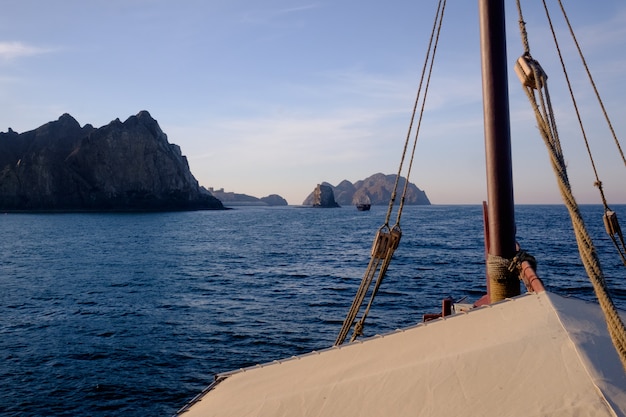 embark on a traditional boat sunset cruise off the coast