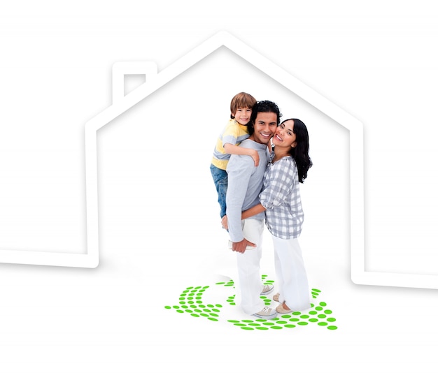 Embracing family standing with a house illustration