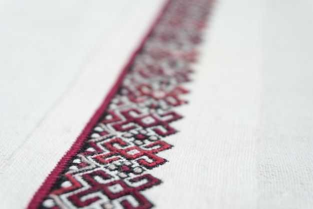 Embroidery fragment. Yarn, fabric.