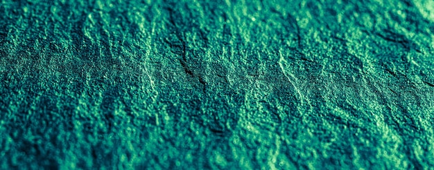 Emerald green stone texture as abstract background design material and textured surface