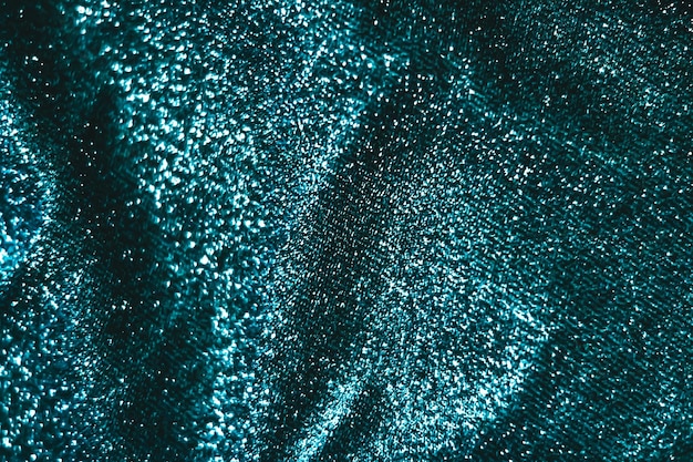 Emerald holiday sparkling glitter abstract background luxury shiny fabric material for glamour design and festive invitation