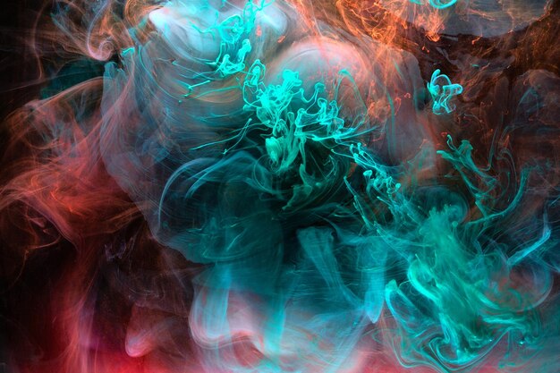 Emerald red ink abstract background Acrylic paint backdrop for perfume hookah cosmetics Mysterious smoke clouds colorful fog