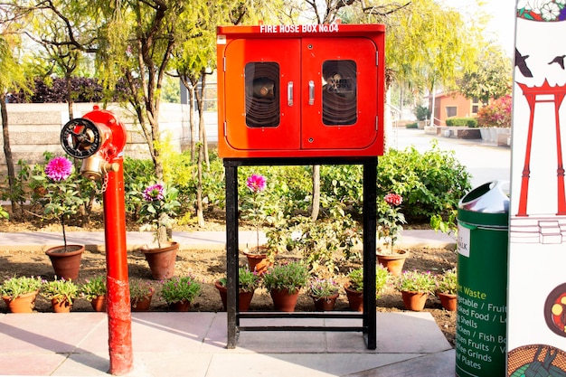 Emergency fire equipment station for firefighter and caution label patio park garden of Department store while at thai festival on March 15 2019 in New Delhi India