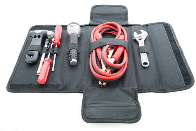 Emergency kit , car jack, jumper cables for car