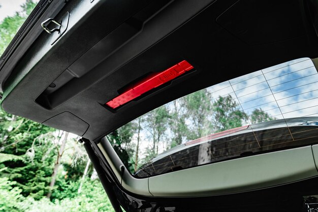 Emergency stop sign in car trunk.