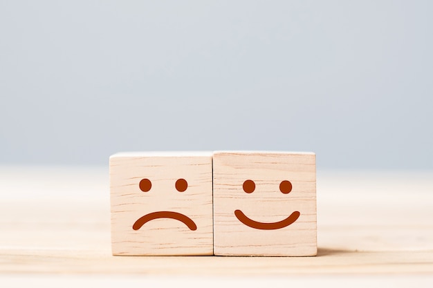 emotion face symbol on wooden blocks