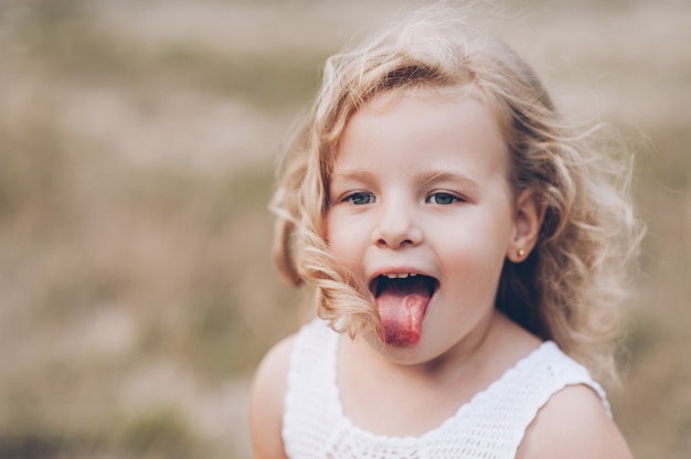 emotional child girl outdoors