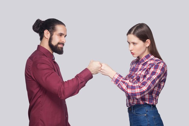 Emotional couple on gray background