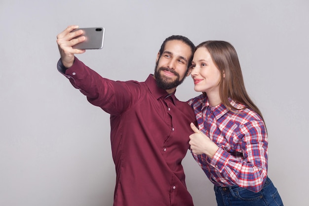 Emotional couple on gray background