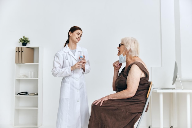 Emotional elderly woman vaccination fun