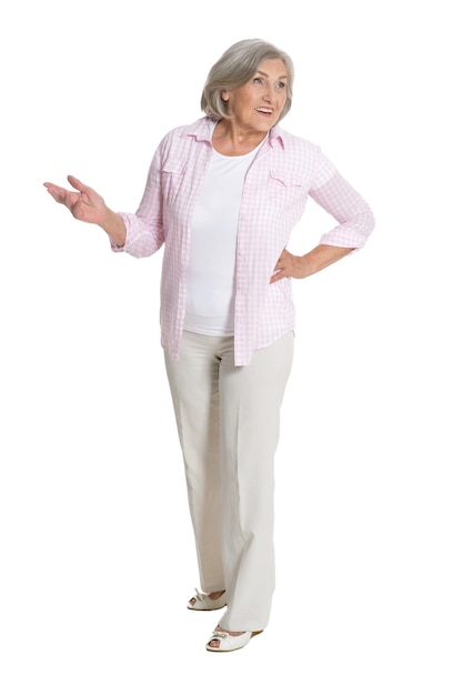 Emotional elderly woman on a white background