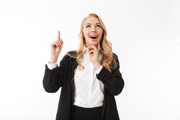 Photo emotional excited businesswoman pointing up