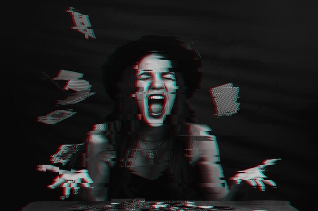 Emotional gambling woman in a hat plays poker at the table and throws playing cards