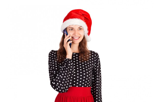 emotional girl in santa claus christmas hat 