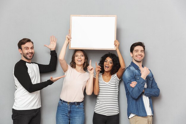 Emotional loving couples friends holding copyspace blank.