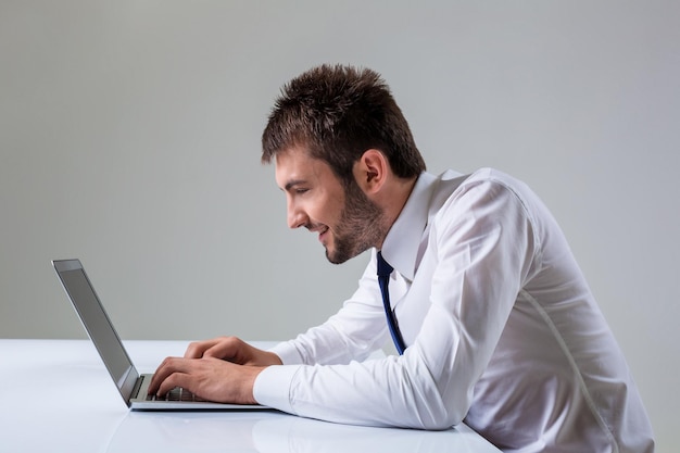 Emotional man and laptop