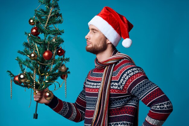 Emotional man in New Year's clothes advertising copy space studio posing High quality photo