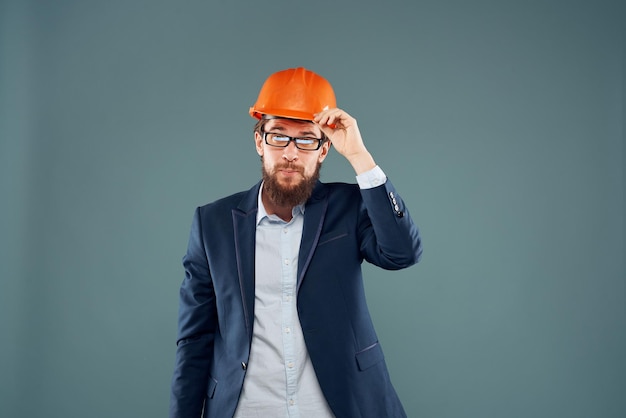 Emotional man in orange hard hat engineer work industry construction