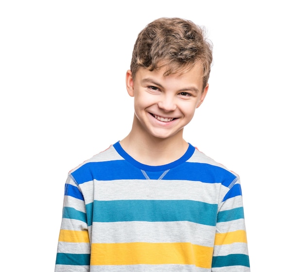 Emotional portrait of caucasian teen boy Funny teenager smiling isolated on white background Handsome child looking at camera