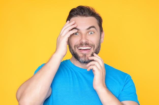 Emotional scared man looks with frightened expression nervously demonstrates phobia Human reaction and emotions Oops Close up of sad terrified man horrified facial expression bite fingers