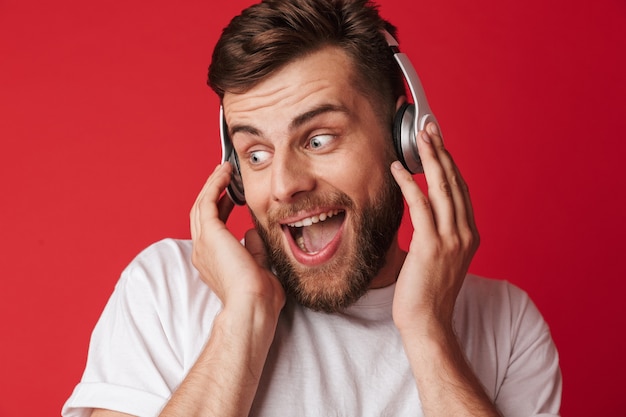 Emotional screaming young man isolated