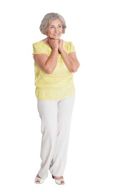 Emotional senior woman posing isolated