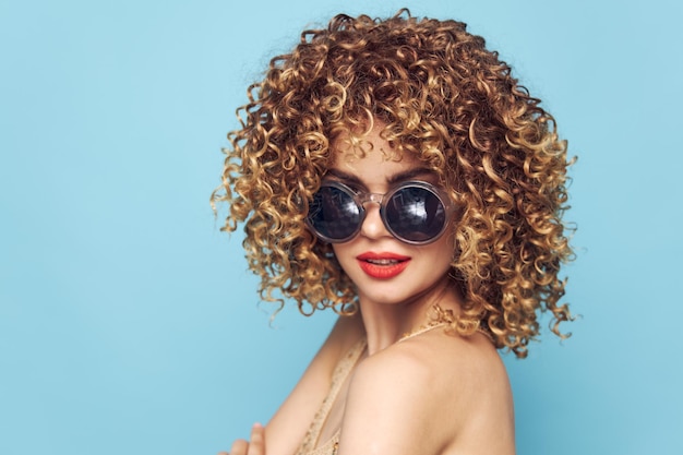 Emotional woman Curly hair red lips closeup heart glasses