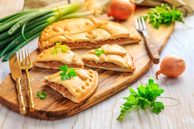 Empanada Gallega traditional pie stuffed with tuna Galician and Spanish cuisine Tart with tuna and vegetables