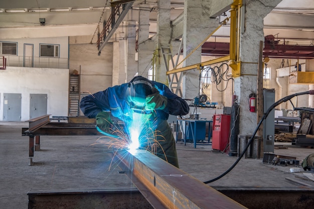 The employee conducting gas welding works