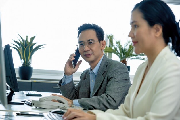 employee consulting client on phone