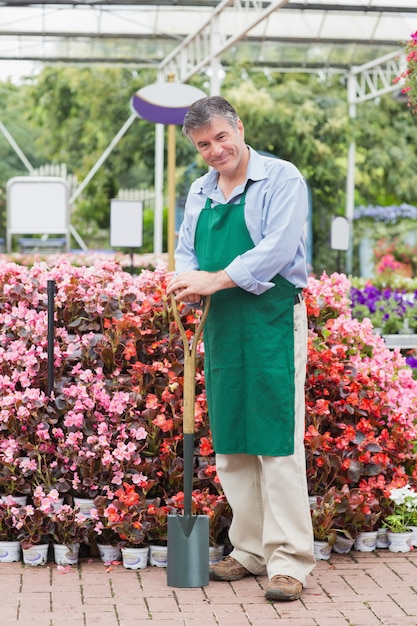 Employee holding spade