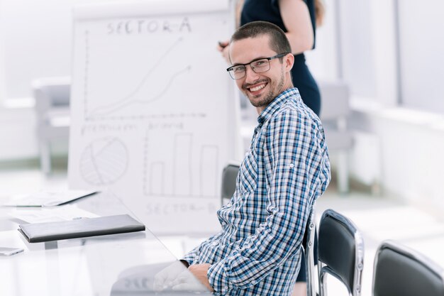 employee sitting at his Desk