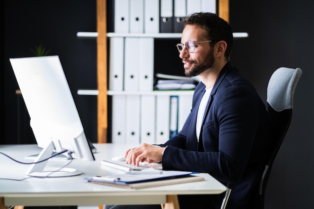 Employee Using Business Computer