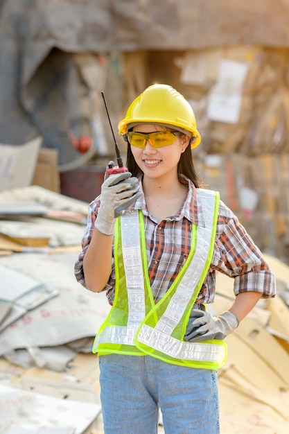 Employee of waste recycling plant Radio communication