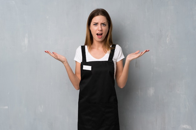 Employee woman with shocked facial expression