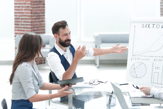 Employees of the company discussing a new financial project