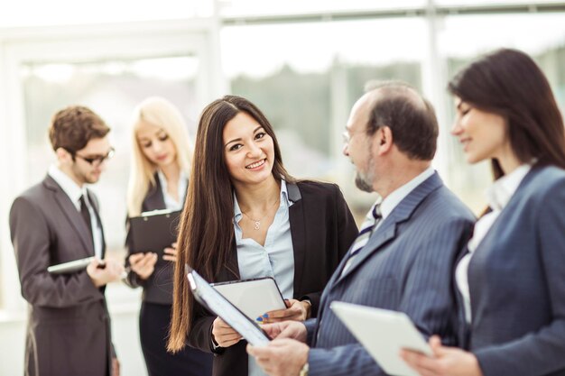 Employees discuss their goals before the start of the workshop