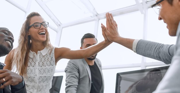 Photo employees greet each other in the office