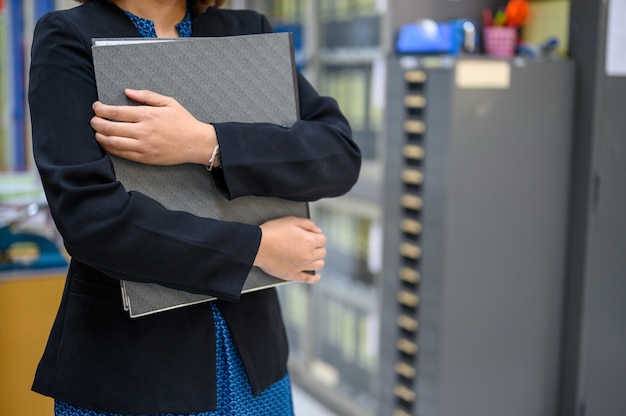 Employees use mobile black documents at the office